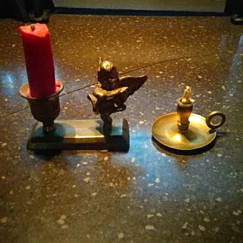 2 brass candle holders.
